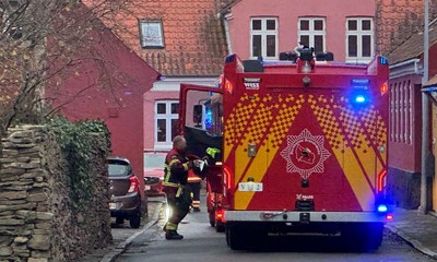 Ventilatorhj�lp efter ulmende papirkurv