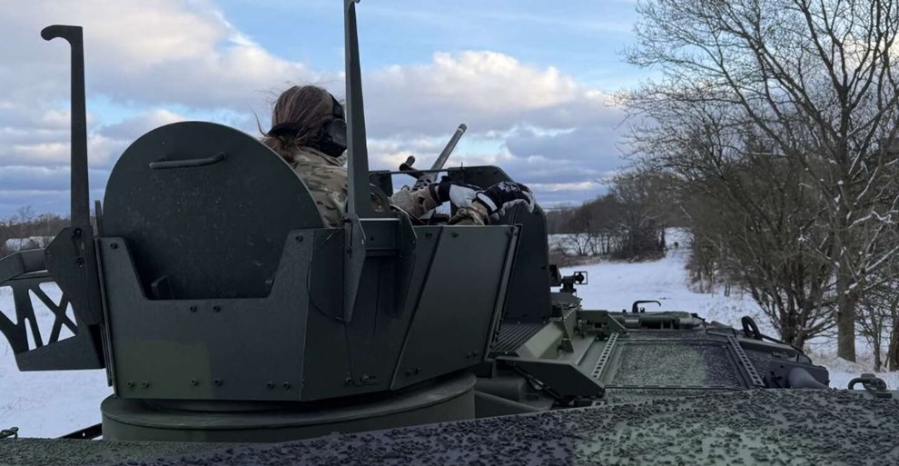 Nogle vil have mere milit�r: Morten Riis mist�nker, de har en bagtanke